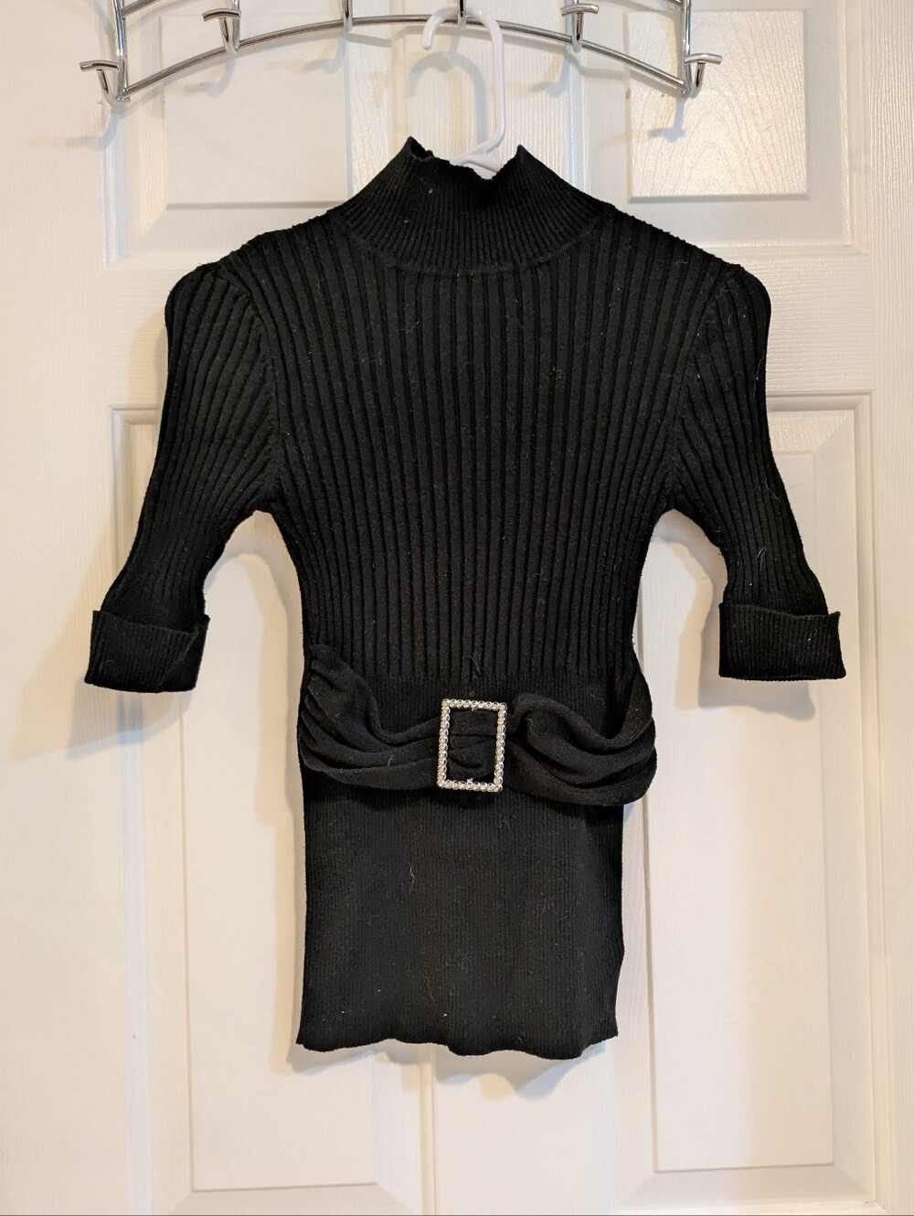 Black Ribbed Mock Neck Sweater with Rhinestone Buckle Detail